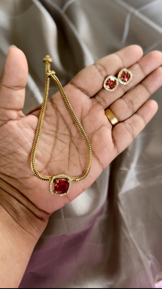 Single stone necklace with studs